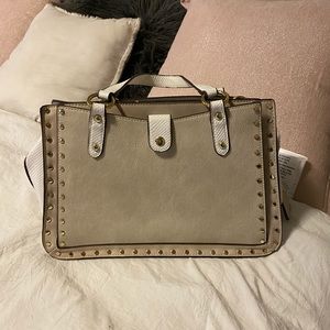white and tan handbag